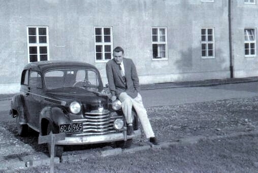 Charlie Weaver, Company Clerk, 596th Transportation Company with his1950 Opel Olympia in June 1956
